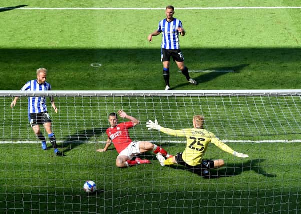 Bristol City's Tommy Rowe scores his side's first goal against Sheffield Wednesday (Picture: PA)
