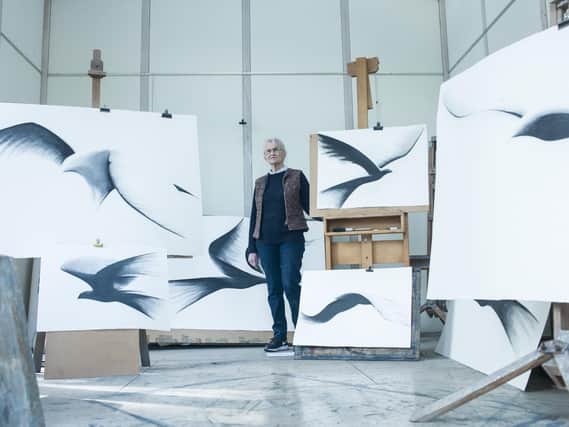 Sculptor Bridget McCrum with studies of birds in flight. (Picture credit: Steve Russell Studios Ltd).