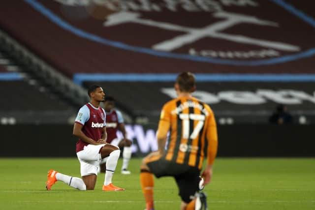 West Ham United's Sebastien Haller takes a knee in support of the Black Lives Matter movement prior to the Carabao Cup third round match against Hull last week (Picture: PA)