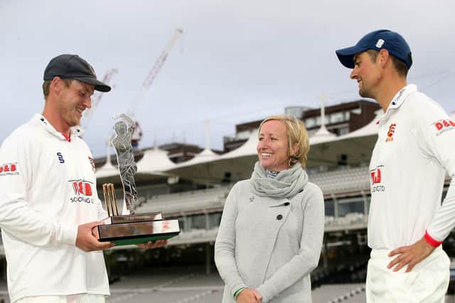 Winners: Essex's Tom Westley, left, with the trophy alongside Bob Willis' wife Lauren Clark and Sir Alastair Cook. (Picture: PA)