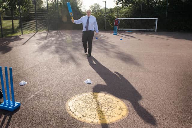 Prime Minister Boris Johnson meets pupils and takes part in a game of cricket during a visit to Ruislip High School in his constituency of Uxbridge, west London.