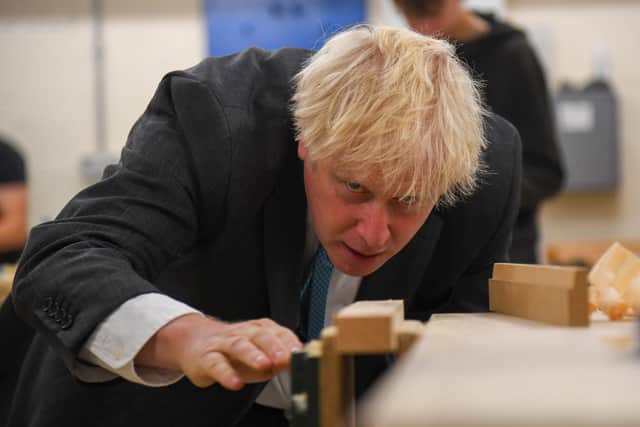 Boris Johnsob during a visit on Tuesday to Exeter College.