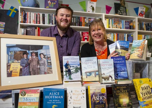 Owners Linda Furniss and James Firth at The Striped Badger bookshop in Grassington, which is seeing an upturn in visitors after being used as part of the set for the new series of All Creatures Great and Small.