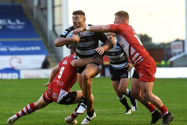 Hull FC stand-off Jake Connor in action against Salford last week. He'll have Marc Sneyd back alongside him tomorrow. (PIC: JONATHAN GAWTHORPE)