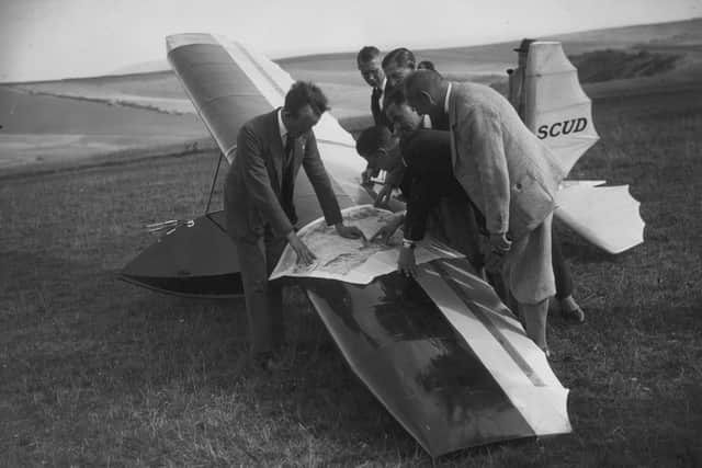 Foreign entrants in a British Gliding Association competition being give directions over a Scud glider on the Sussex Downs.   (Photo by J Gaiger/Getty Images)
