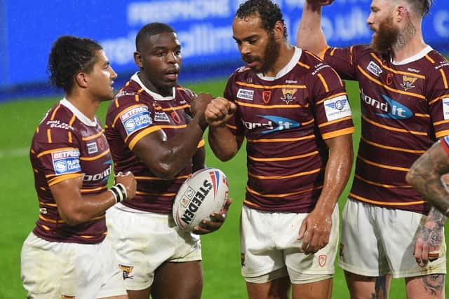 Huddersfield Giants' Jermaine McGillvary celebrates the first of his two tries (PIC: JONATHAN GAWTHORPE)