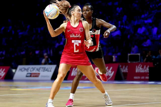 England's Jade Clarke (left) and Trinidad and Tobago's Candice Guerero in action during the Netball World Cup match at the M&S Bank Arena, Liverpool last July. Picture: Nigel French/PA