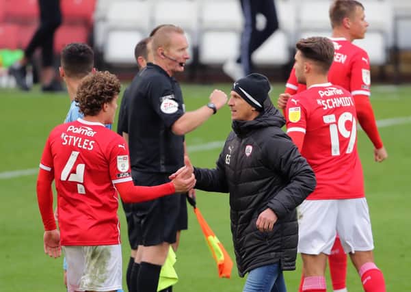 Barnsley head coach Gerhard Struber, right, shakes hands with Callum Styles at full-time at Oakwell after the 0-0 draw with Coventry. Picture: Richard Sellers/PA