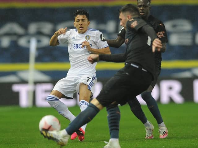 Leeds United's Ian Poveda is challenged by Manchester City's Aymeric Laporte. Picture: Simon Hulme