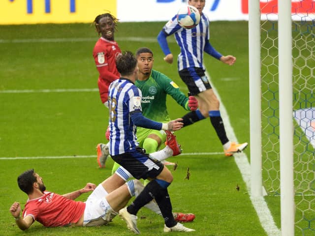 QPR’s Yoann Barbet diverts the ball into his own net. Picture: Steve Ellis