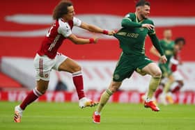 LET-OFF: David Luiz escaped punishment for this fifth-minute pull on Oliver Burke