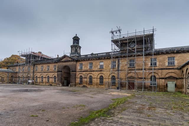The stable block and courtyard have fallen into neglect