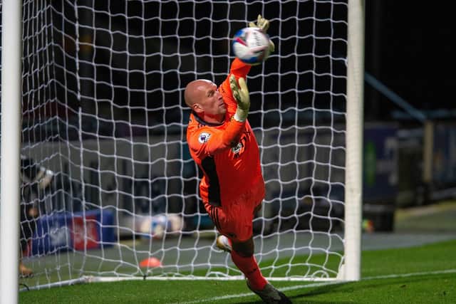 John Ruddy who saved Connor Shanks's shot in the penalty shoot out.