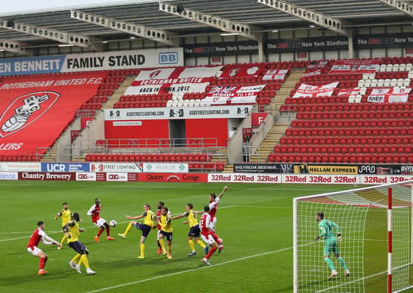 Rotherham United play against Huddersfield Town in front of empty stands, a situation that chairman Tony Stewart says has to end sooner rather than later. Picture: Richard Sellers/PA