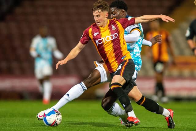 Kian Scales and Owen Otasowie challenge for the ball nduring Tuesday night's EFL Trophy clash at Valley Parade.  Picture: Bruce Rollinson