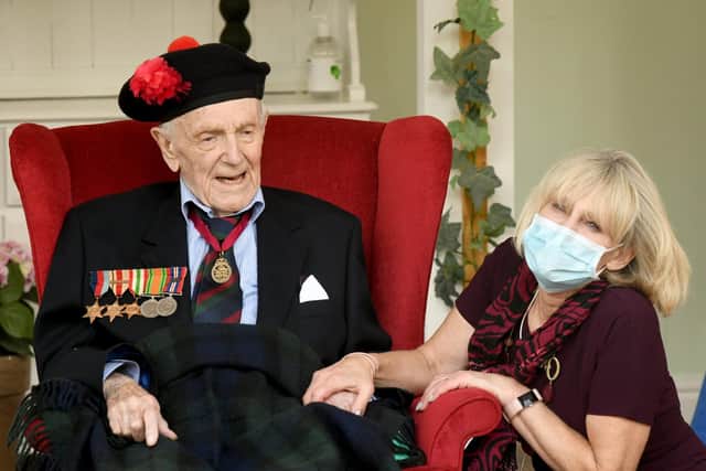 Henry McKenzie Johnston a 99 year old veteran of WW2 with Judith Christofferson Manager of the Greenwell Nursing Home in Bedale. Image: Gary Longbottom