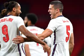 England's Conor Coady (right) celebrates scoring his side's second goal of the game with Dominic Calvert-Lewin.
