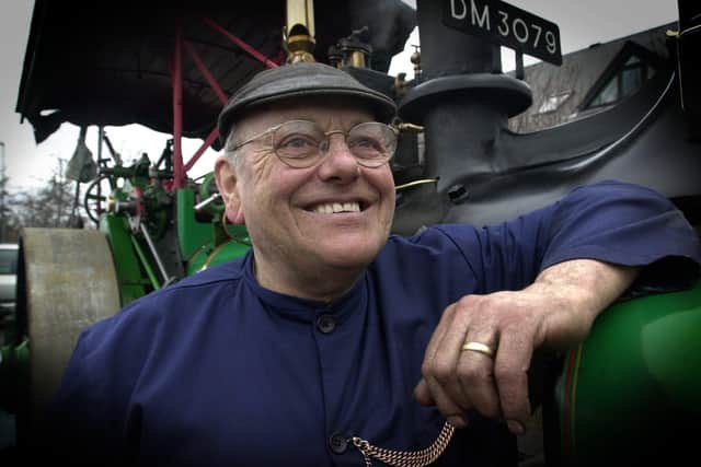 Fred Dibnah next to his steam roller Besty, which has been made into a model.