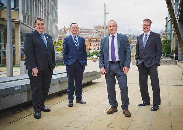 Charles Neal (left) and Matthew Rodgers, of Bell & Buxton Solicitors, Trevor Ironmonger, co-founder of Ironmonger Curtis, and Alex Ross, managing partner of Bell & Buxton Solicitors.