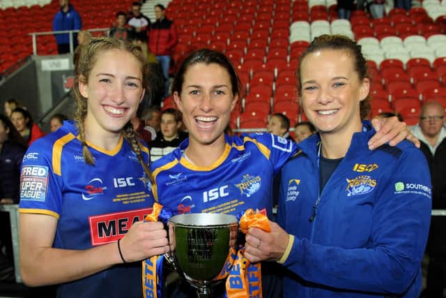 Caitlin Beevers, Courtney Hill, captain, and Lois Forsell, club captain for Leeds Rhinos after their 2019 title win (Picture: Steve Riding)