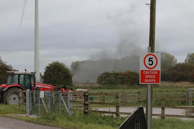 Smoke from the explosion can be seen (photo: Sean Stewart)