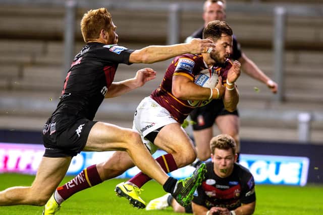 Huddersfield Giants' Aidan Sezer goes in for his second try (BRUCE ROLLINSON)
