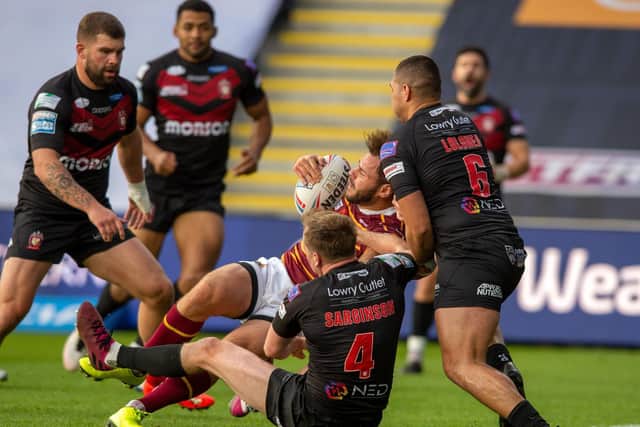 Huddersfield Giants' Aidan Sezer twists over for his side's second try. (PIC:BRUCE ROLLINSON)