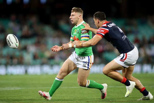 England's George Williams of the Raiders offloads the ball during the NRL Semi Final match between the Sydney Roosters and the Canberra Raiders  (Picture: Mark Kolbe/Getty Images)