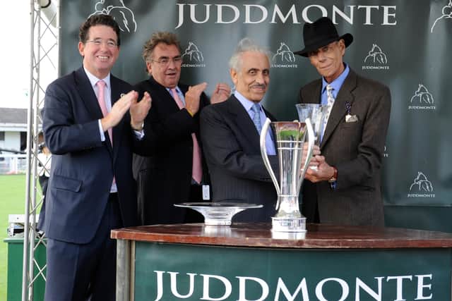 Lord Teddy Grimthorpe (left) leads the applause after Frankel's win in the 2012 Juddmonte International. He's pictured with Prince Khalid Abdullah, the late Sir Henry Cecil and Philip Mitchell of Juddmonte Farms.