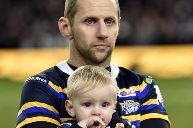 Rob Burrow with son Jackson at Leeds Rhinos testimonial in January of this year.