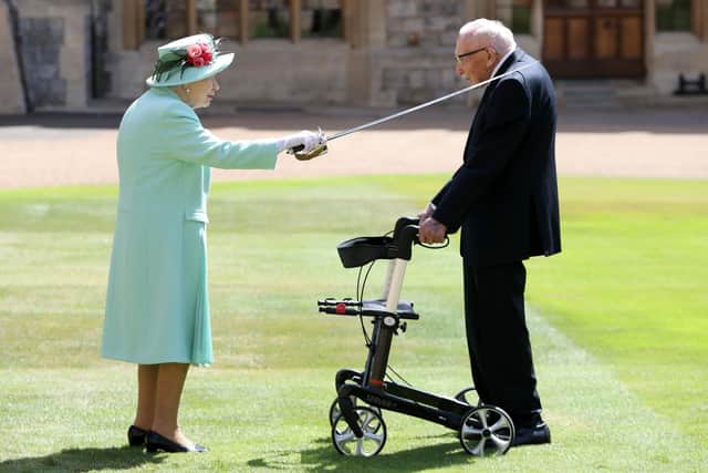 This was the Queen awarding Captain Sir Tom Moore his knighthood in the grounds of Windsor Castle.