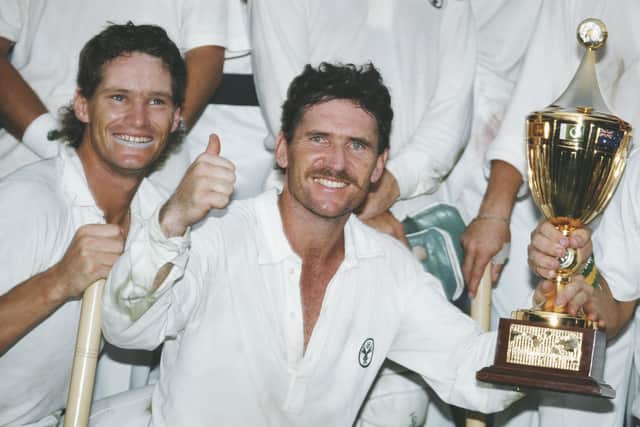 World Cup winners: Australia captain Allan Border holds the trophy as Dean Jones looks on after Australia had beaten England by seven runs to win the 1987 Cricket World Cup final in Calcutta, India. Picture: Getty Images