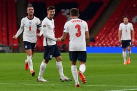 England’s Mason Mount celebrates his winner with team-mates to secure a 2-1 win over Belgium in the UEFA Nations League group stage match at Wembley Stadium. Picture: Neil Hall - Pool/Getty Images