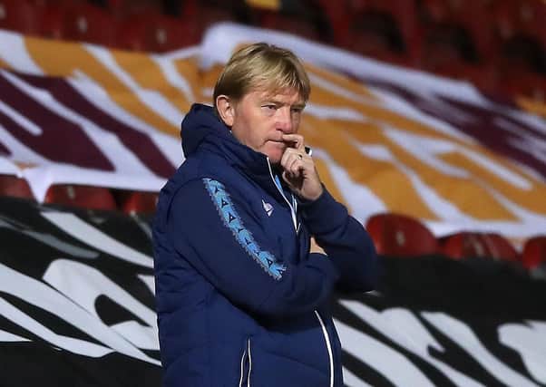 Bradford manager Stuart McCall: Looking on against Harrogate Town. Picture: PA