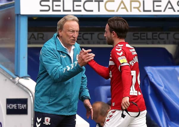 Reunited - Middlesbrough manager Neil Warnock and Patrick Roberts (Picture: PA)