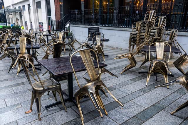Empty tables outside bars in Leeds city centre this week
