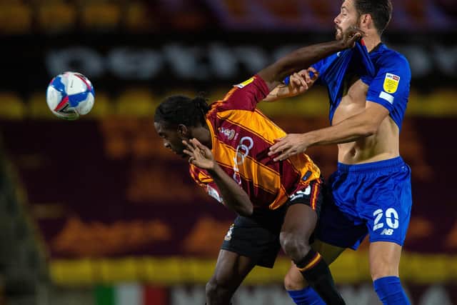 Clayton Donaldson holds off Connor Hall (Picture: Bruce Rollinson)