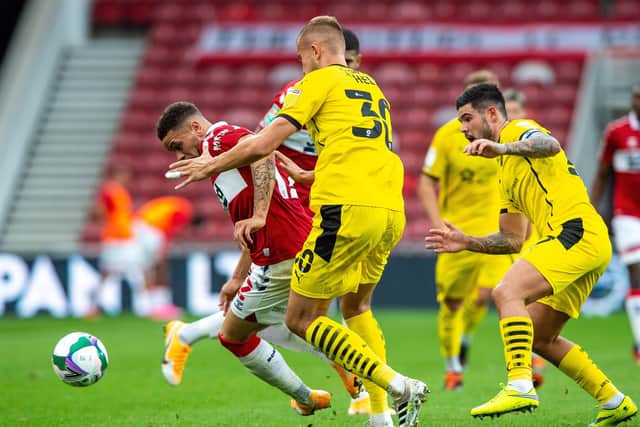 Marcus Browne moves past Michal Helik for Barnsley. (Picture: Bruce Rollinson)