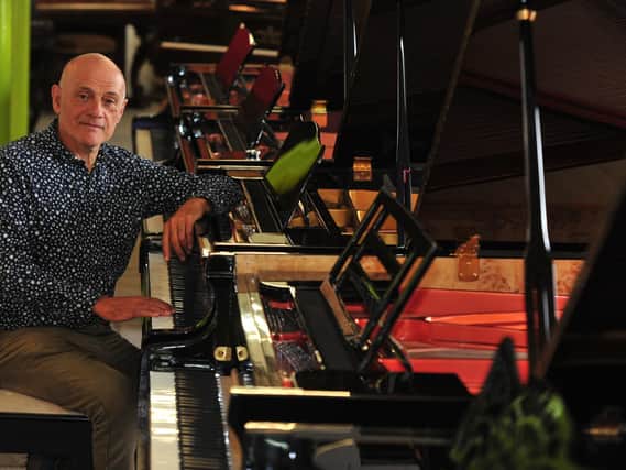 Melvin Besbrode in his piano showroom in Leeds. (Picture: Gerard Binks).