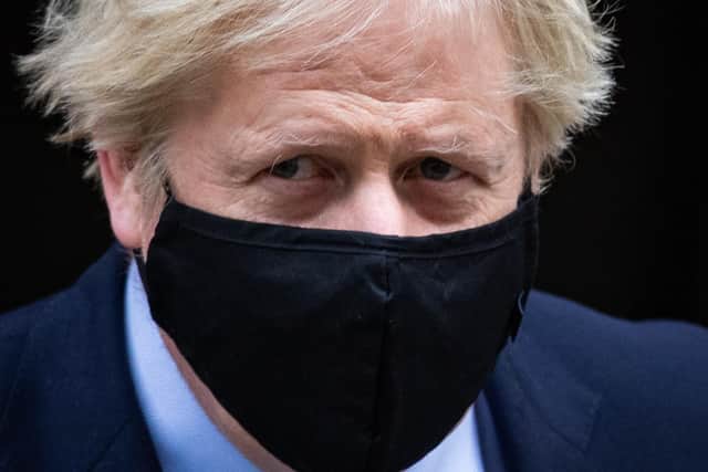 Boris Johnson sported this face covering before leaving 10 Downing Street for Prime Minister's Questions.