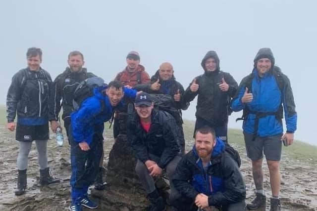 Joe Ramsden and his friends climb the Yorkshire Three Peaks for Leeds Cares after he lost his first baby
