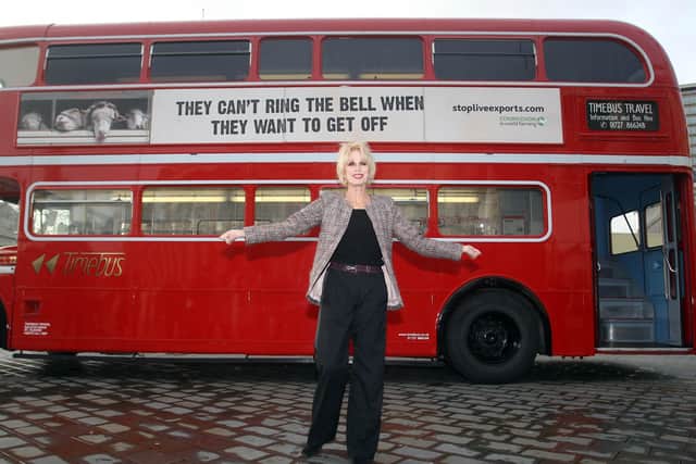 Actress Joanna Lumley, stands next to a Routemaster bus, during the launch by Compassion in World Farming of a new advertising campaign aimed to end long distance animal transportation in 2012, at Trafalgar Square, London.
