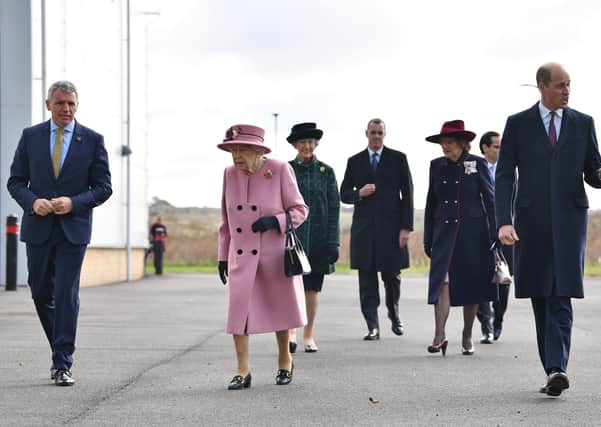 The Queen led by example on the two-metre rulemwhen she, and the Duke of Cambridge, visited the Portdon Down laboratories.