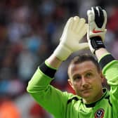 Thanks: Sheffield United goalkeeper Paddy Kenny applauds the fans as he makes his return after a nine-month suspension. Picture: PA