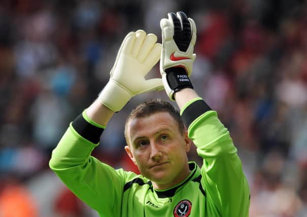 Thanks: Sheffield United goalkeeper Paddy Kenny applauds the fans as he makes his return after a nine-month suspension. Picture: PA