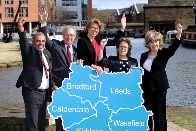 Susan Hinchcliffe (centre) celebrates the West Yorkshire devolution deal with her fellow council leaders.