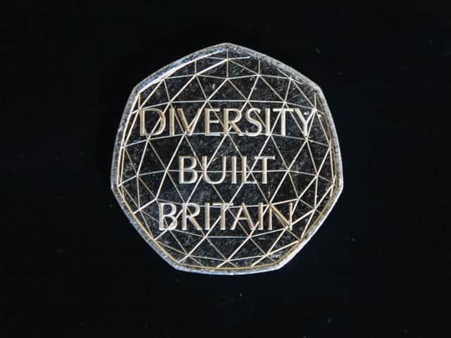 The coins features the words "Diversity built Britain" and a geodome, representing connection and strength. PIC: PA