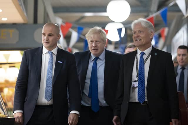 Boris Johnson with (left) Jake Berry, the then Northern Powerhouse Minister, at last year's Convention of the North.