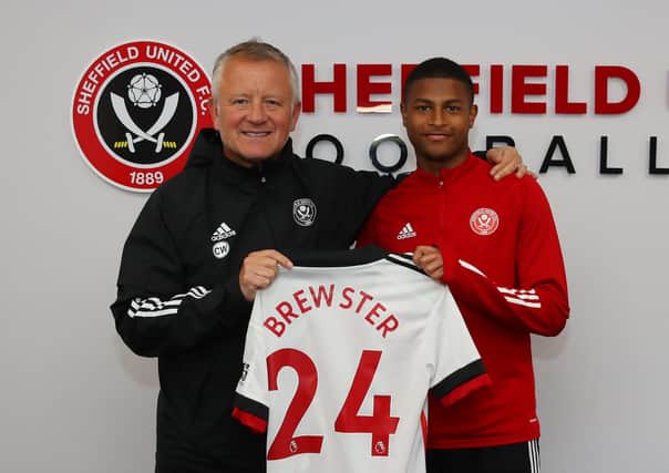 Chris Wilder manager of Sheffield Utd welcomes new signing Rhian Brewster. Picture: Simon Bellis/Sportimage