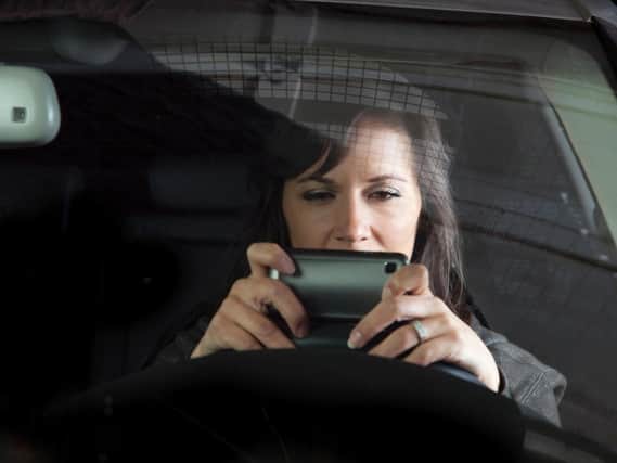 The Department for Transport is consulting on updating laws so that phone calls and texting are not the only functions banned when behind the wheel.